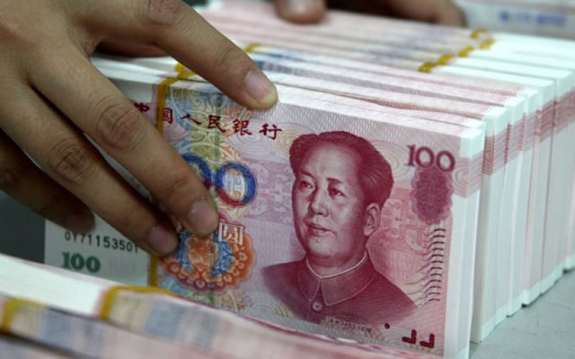 Yuan weakens to 7.1405 against the dollar