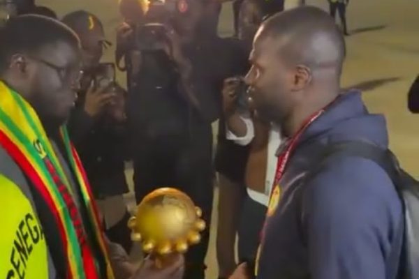 Senegal team returns home, presents AFCON trophy to President