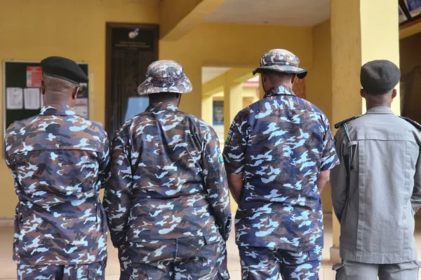 Four officers arrested as ethnic bias video sparks outrage